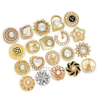 Boutons en or pour manteau